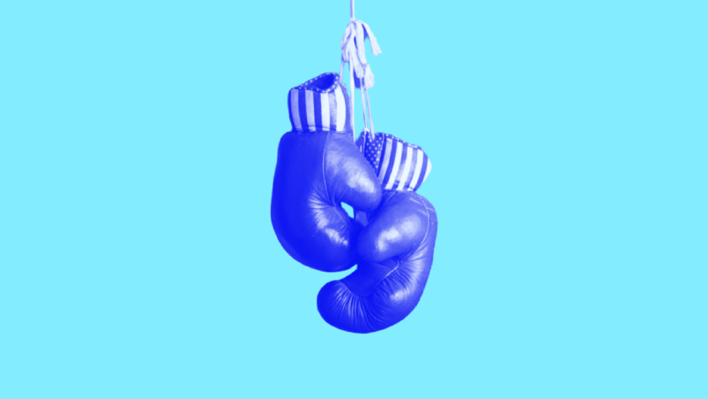 A set of blue-tinted American flag-themed boxing gloves