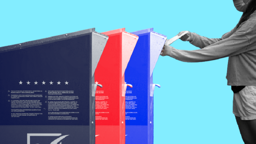 A woman wearing a mask inserting her mail ballot into one of three ballot drop boxes
