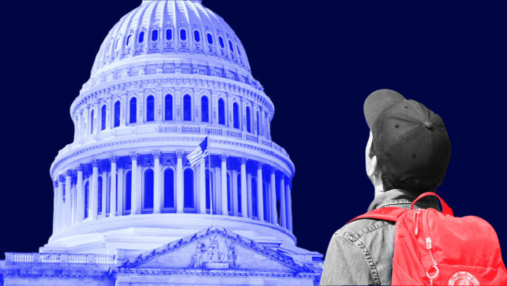 A student looking up at the U.S. Capitol