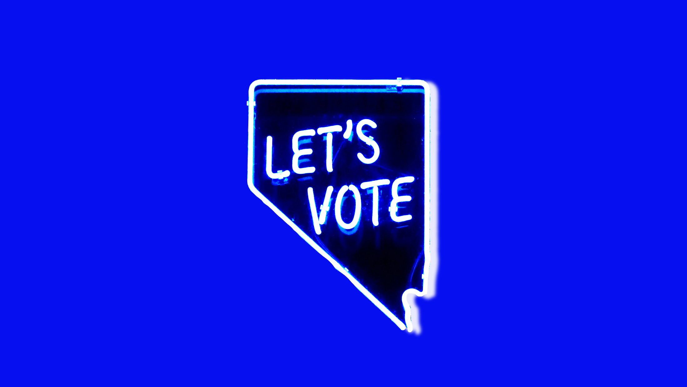 A neon Nevada-shaped sign that says "Let's Vote"