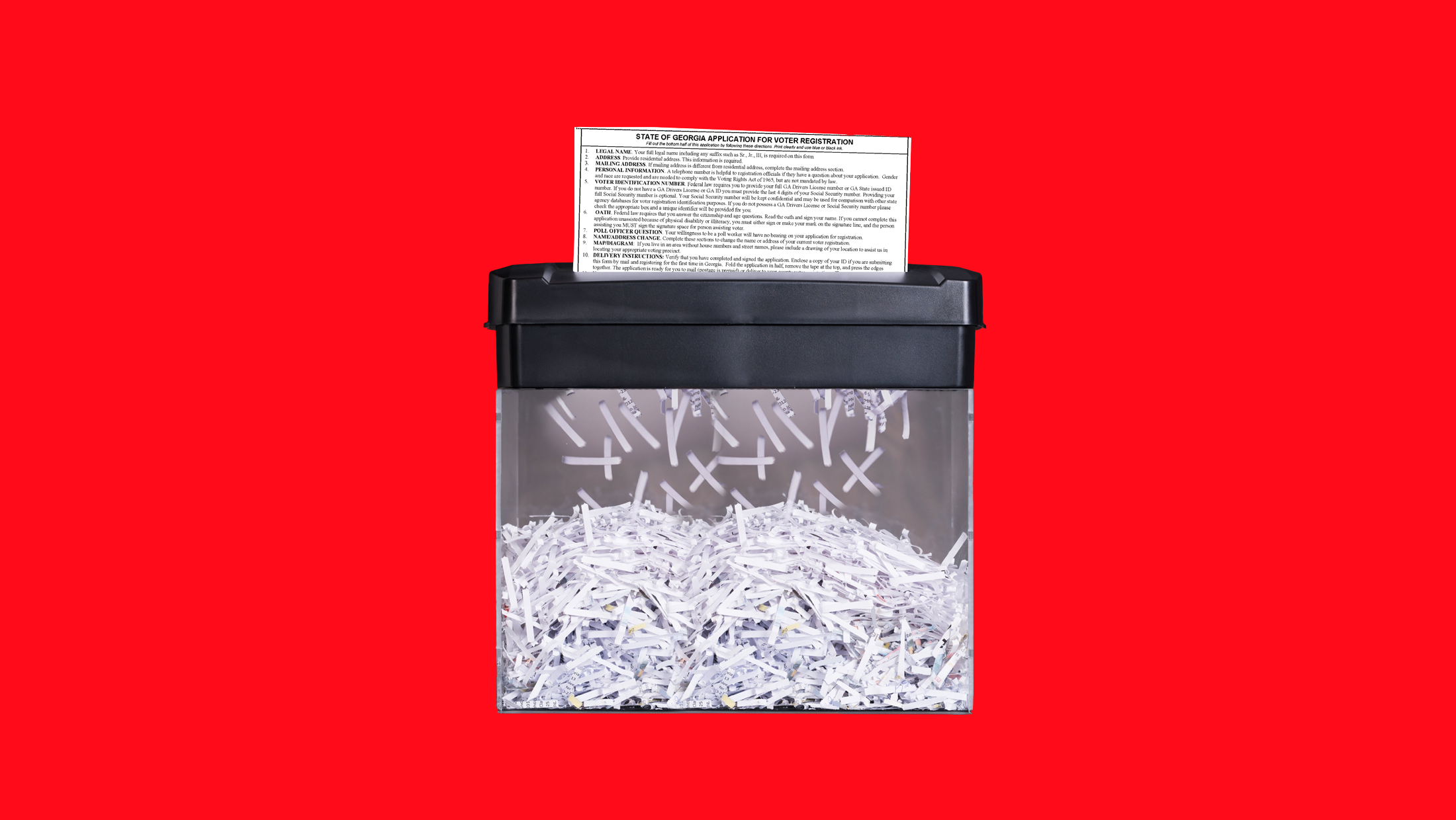 A paper shredder shredding a Georgia voter registration application