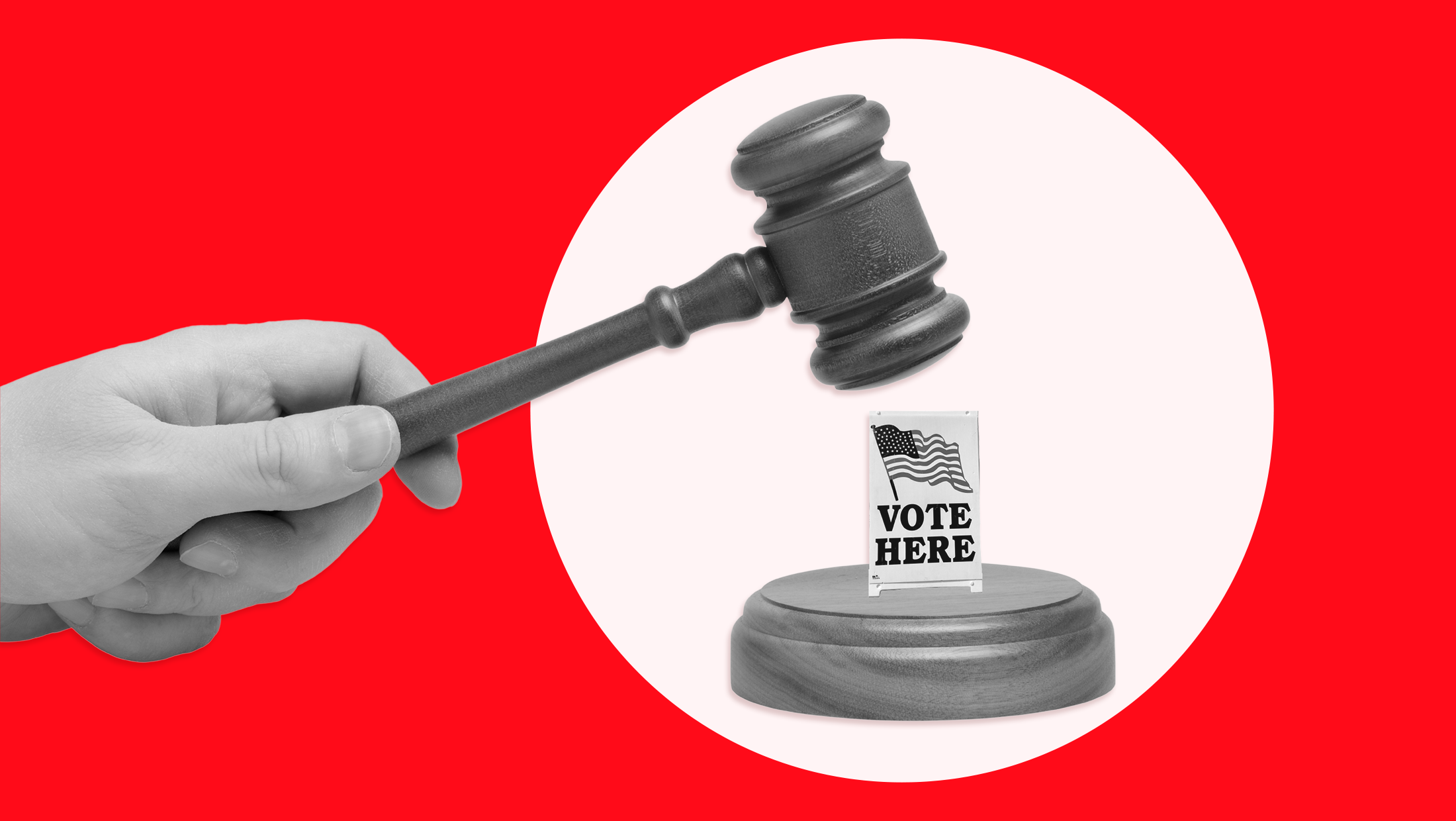 A small "Vote Here" sign sitting on a wooden gavel block with a large looming hand holding a gavel over it, ready to strike