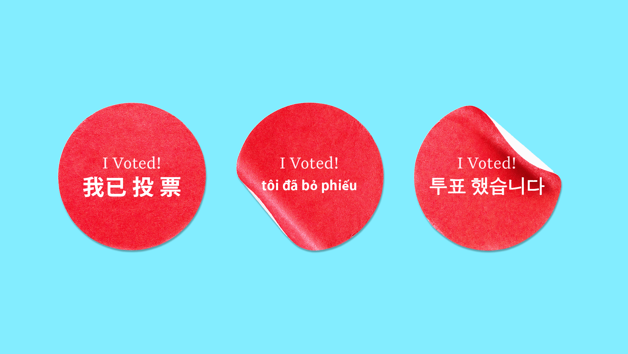 Three voting stickers that say "I VOTED" in English paired translations of "I VOTED" in Chinese, Vietnamese, and Korean