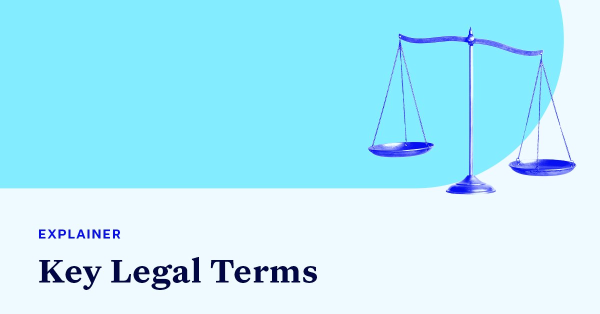 A scale accompanied by small text that says "EXPLAINER" and large text that says “Key Legal terms"