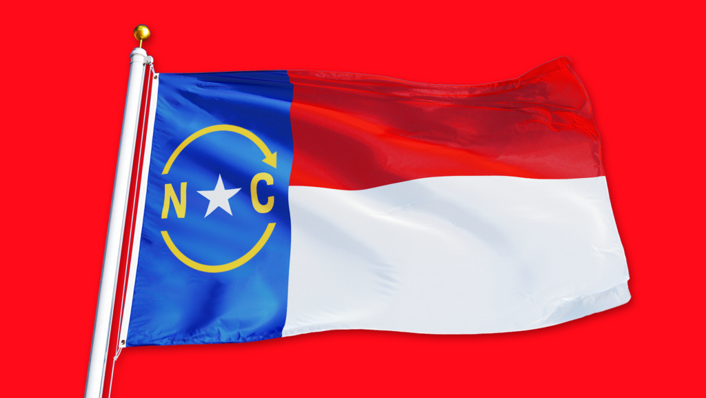 The North Carolina flag on a red background, with reverse arrows around the N and the C on the flag.