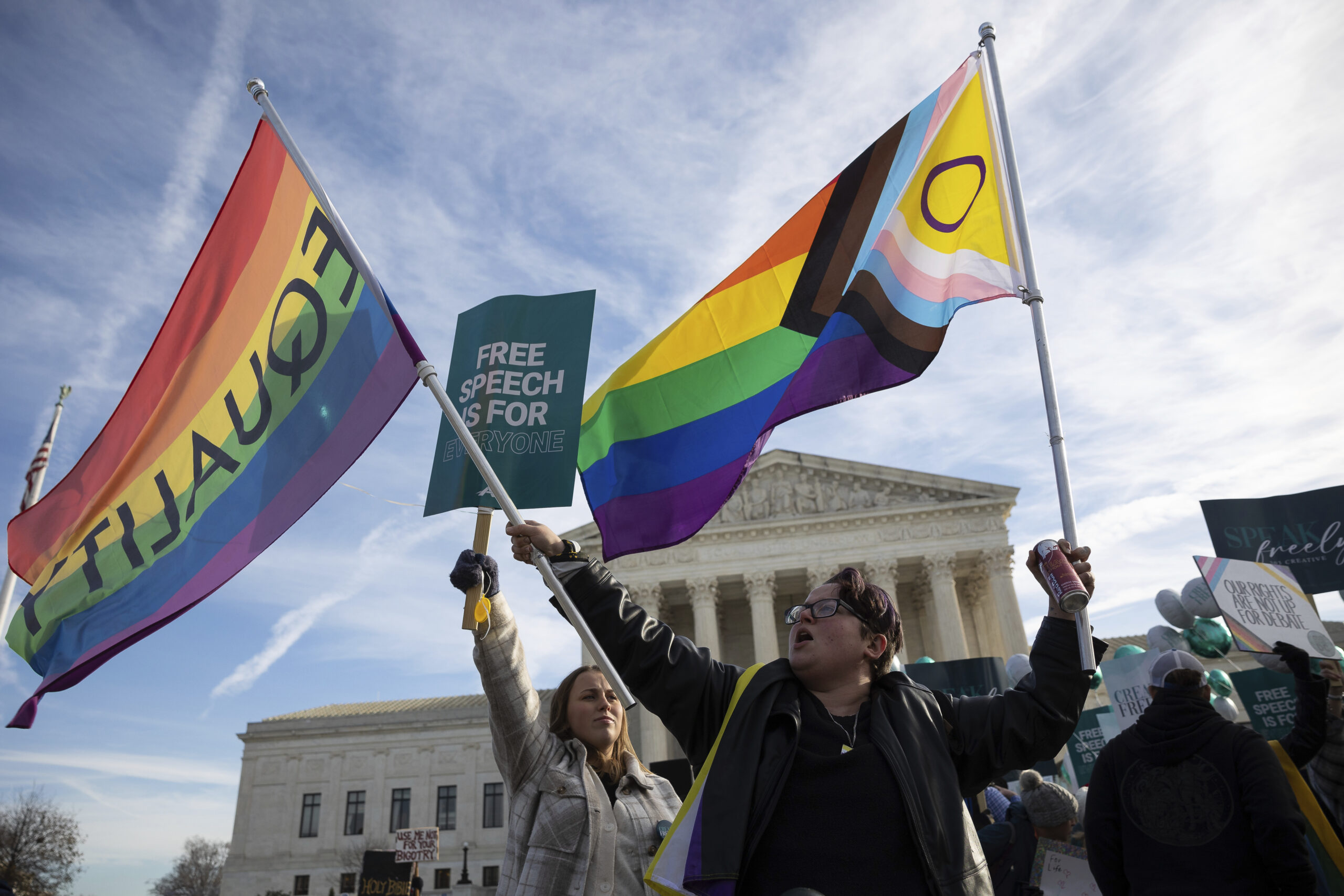 Demonstrators are seen outside the Supreme Court before justices heard oral arguments on 303 Creative LLC v. Elenis Dec. 5, 2022 (Francis Chung/POLITICO via AP Images)