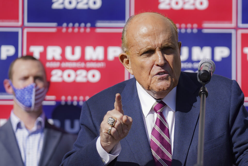 Former New York mayor Rudy Giuliani, a lawyer for President Donald Trump, speaks during a news conference at Four Seasons Total Landscaping on legal challenges to vote counting in Pennsylvania, Saturday Nov. 7, 2020, in Philadelphia.