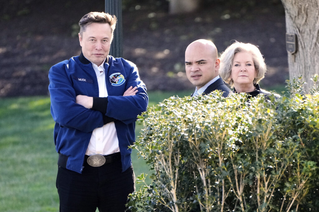 Elon Musk, from left, Walt Nauta and White House chief of staff Susie Wiles depart the White House, Friday, Mar. 21, 2025, in Washington. (AP Photo/Mark Schiefelbein)