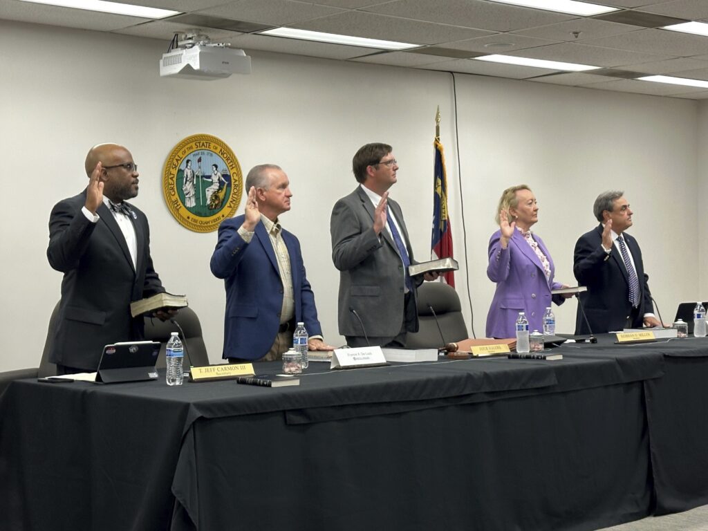 Members of the North Carolina State Board of Elections take their oaths of office in May.