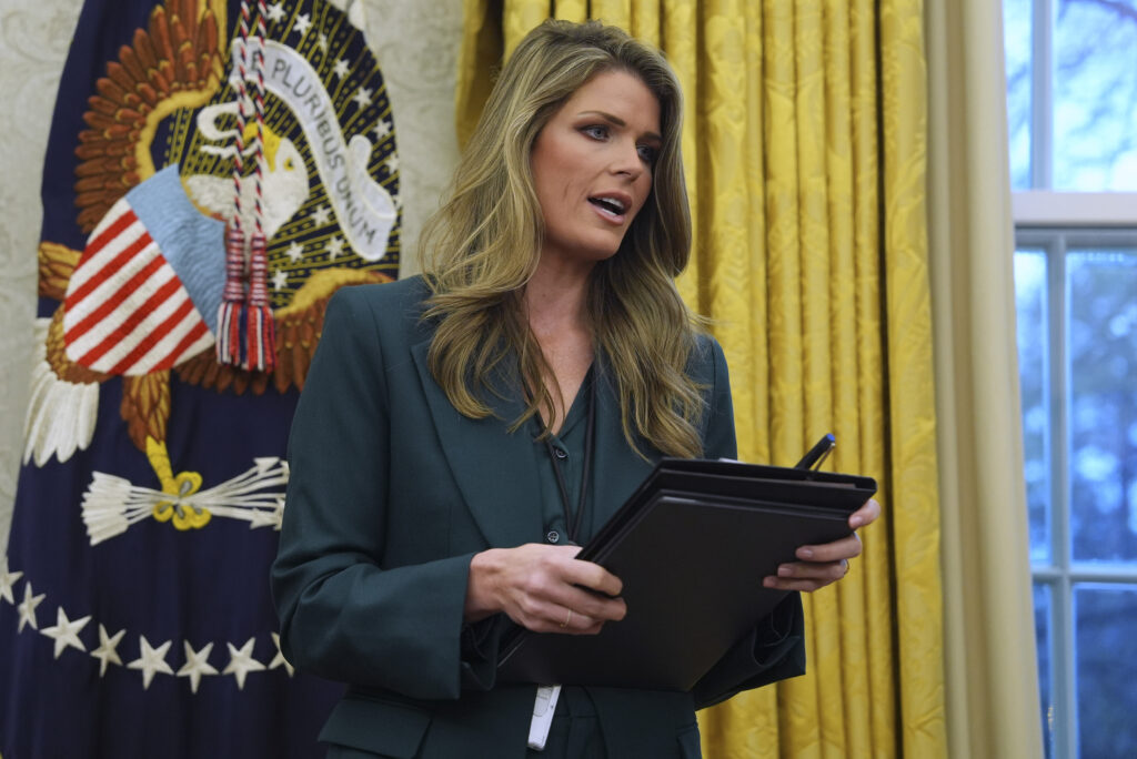 Lindsey Halligan speaks as President Donald Trump signs executive orders in the Oval Office of the White House in January 2025.