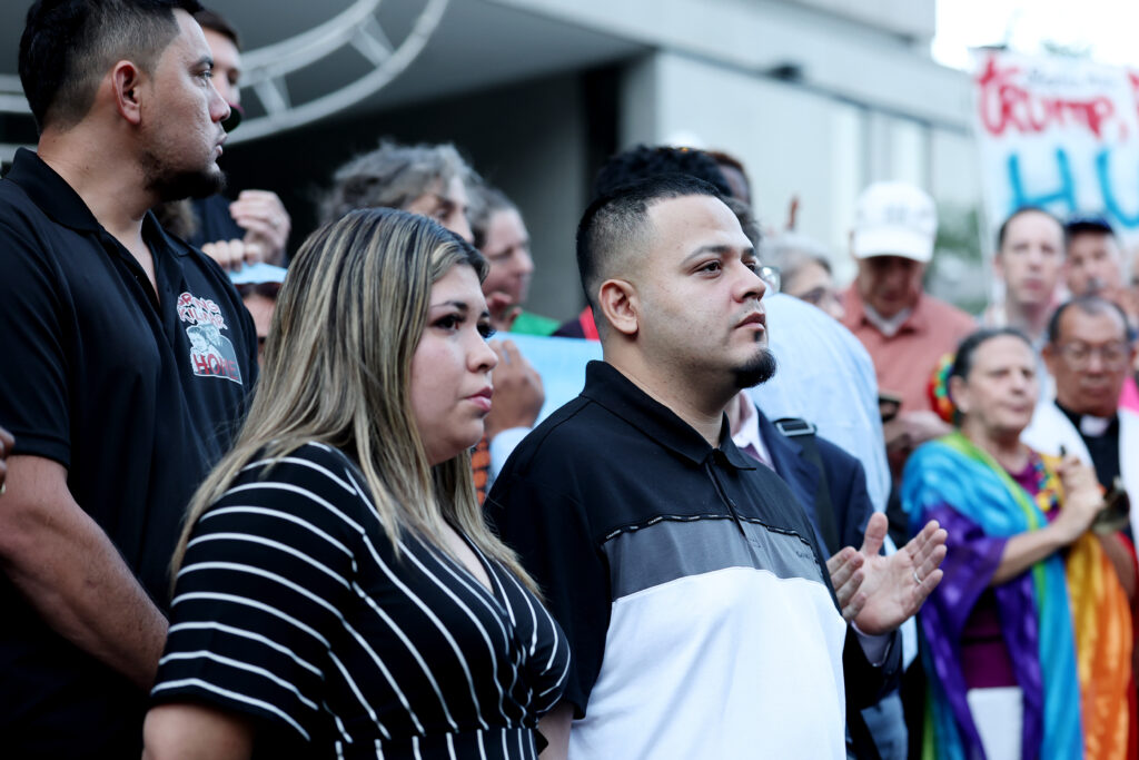 This image has an empty alt attribute; its file name is GettyImages-2231994283-1024x683.jpg
Kilmar Abrego Garcia (R) and his wife Jennifer Vasquez Sura (L) attending a prayer vigil before he enters a Immigration and Customs Enforcement field office in August in Baltimore.
