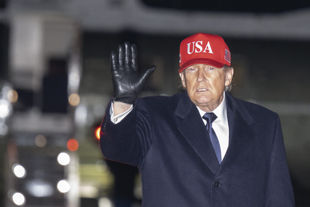 JOINT BASE ANDREWS, MARYLAND - MARCH 1: U.S. President Donald Trump waves to the media after landing aboard Air Force One on March 1, 2026 at Joint Base Andrews, Maryland. (Photo by Roberto Schmidt/Getty Images)