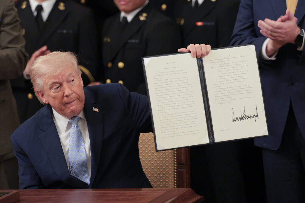 President Trump holding an executive order in the East Room of the White House on March 20, 2026 in Washington, D.C.