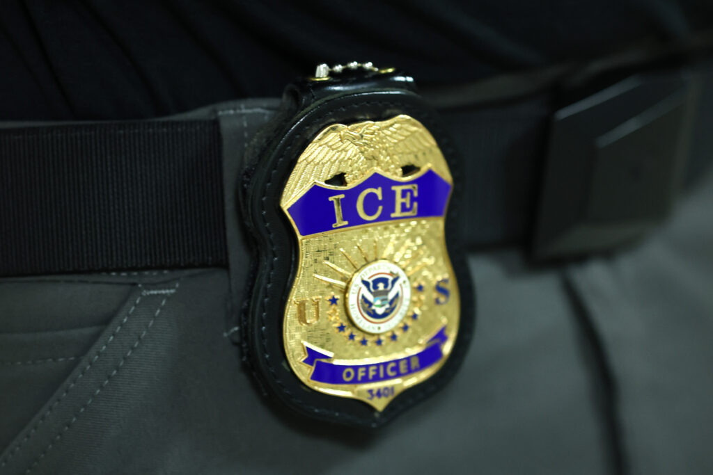 The badge of an Immigration and Customs Enforcement agent in a federal building in New York City, in June 2025. (Photo: Michael M. Santiago/Getty Images)
