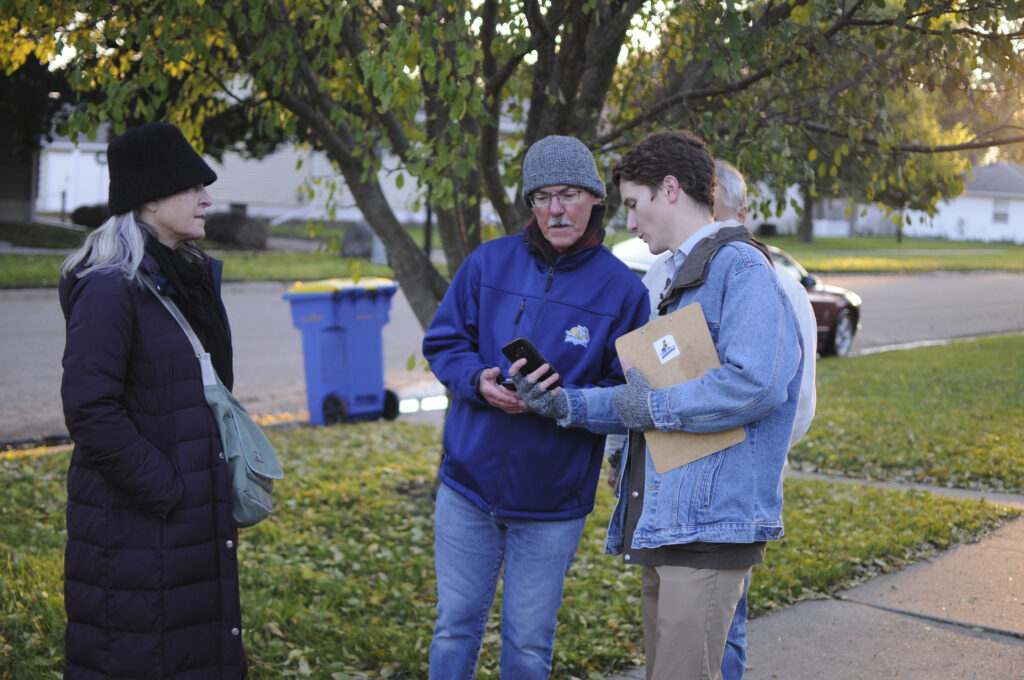 A person gathering signatures for a government ethics amendment in 2018 in Brookings, South Dakota. (Photo: James Nord/AP)