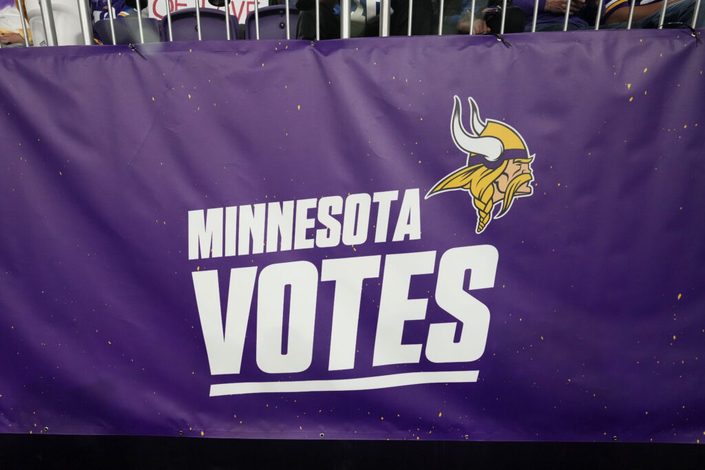 Minnesota Vikings Votes signage is seen in U.S. Bank Stadium during the first half of an NFL football game between the Vikings and the Indianapolis Colts, Sunday, Nov. 3, 2024, in Minneapolis. (AP Photo/Abbie Parr)