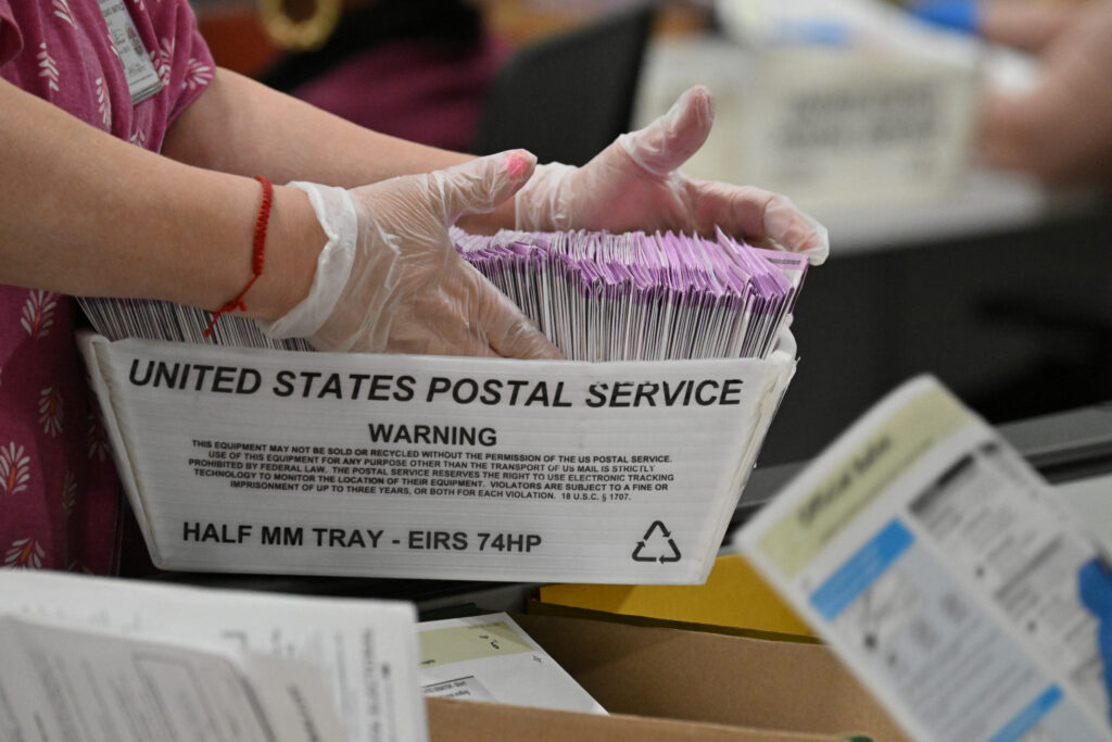 Election workers prepare mail-in ballots for tallying in November 2024, in City of Industry, California. (Photo: Robyn Beck/AFP via Getty Images)