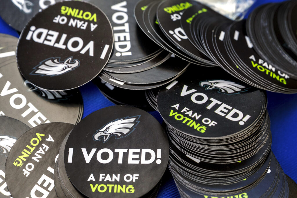 Philadelphia Eagles "I Voted" stickers available during a get-out-the-vote event at City Hall Tuesday, Oct. 29, 2024. (Tom Gralish/The Philadelphia Inquirer via AP)