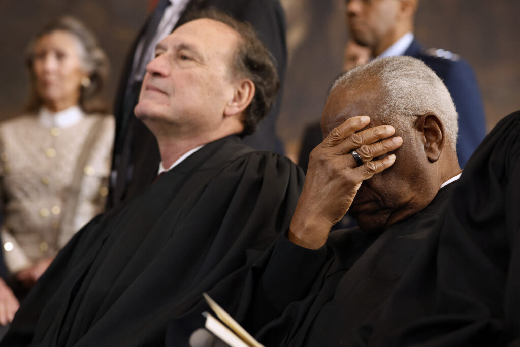 U.S. Supreme Court Associate Justices Samuel Alito (L) and Clarence Thomas attend the presidential inauguration ceremonies at the U.S. Capitol on Jan. 20, 2025, in Washington, D.C. (Photo by Chip Somodevilla / POOL / AFP via Getty Images)