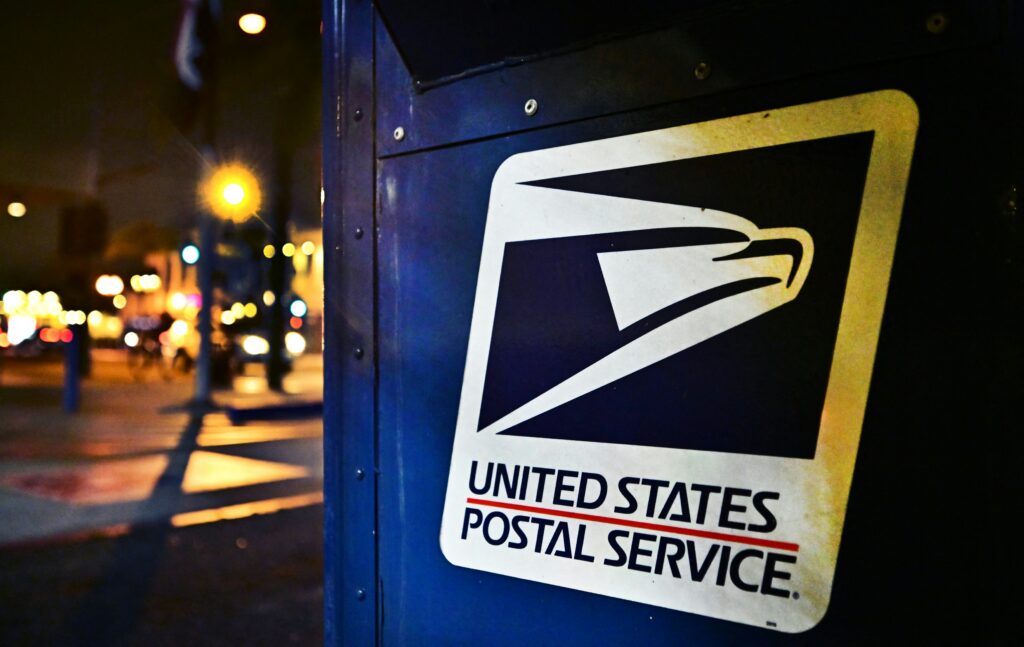 The U.S. Postal Service emblem on the side of a mailbox in Monterey Park, California, in February 2025. (Photo: Frederic j. Brown/AFP via Getty Images)