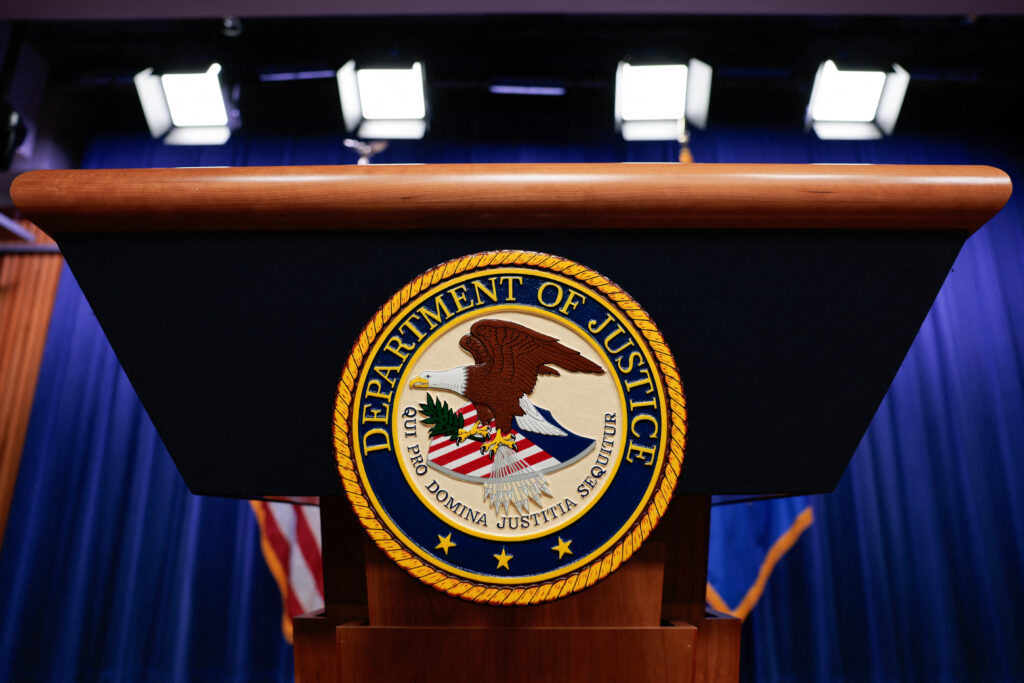 The seal of the Justice Department at DOJ headquarters in April 2026. (Photo: Kent Nishimura / AFP via Getty Images)