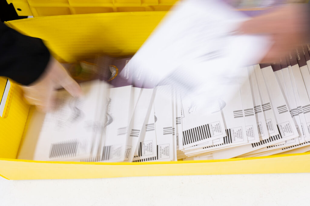 Election workers sorting mail ballots at Contra Costa County's election facility in May 2026 in Martinez, California. (Photo: Benjamin Fanjoy/Getty Images)