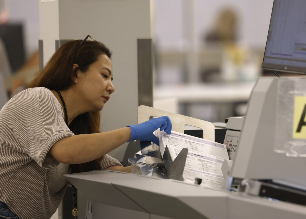 An election worker processes ballots for the California state primary election at the Los Angeles County Ballot Processing Center on June 5, 2026, in City of Industry, Calif. (Photo by Justin Sullivan/Getty Images)