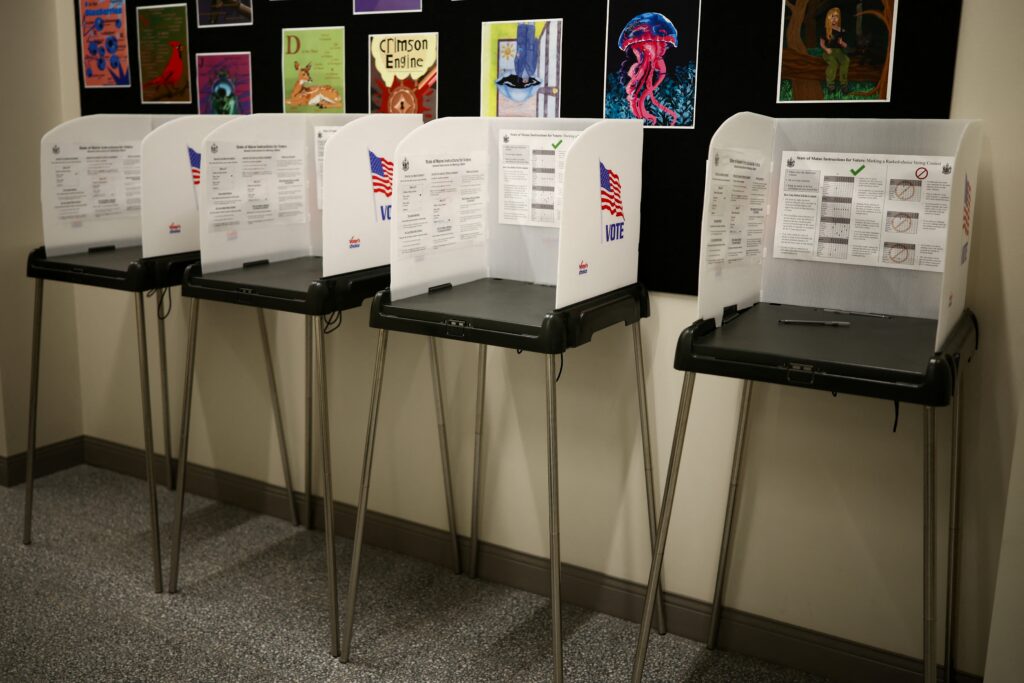 Voting booths are seen in the town hall in Bangor, Maine, during early midterm voting on Oct. 16, 2026. (Photo by Charly Triballeau / AFP via Getty Images)