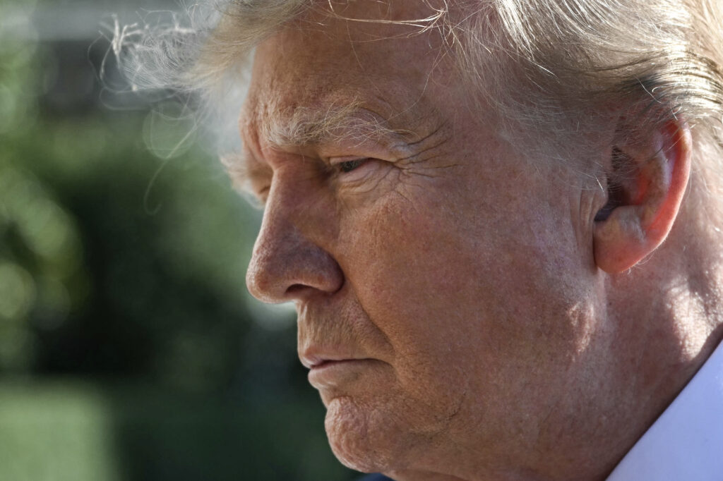 Donald Trump speaks to the media before boarding Marine One in Washington, DC, on October 23, 2026. (Photo by Alex WROBLEWSKI / AFP via Getty Images)