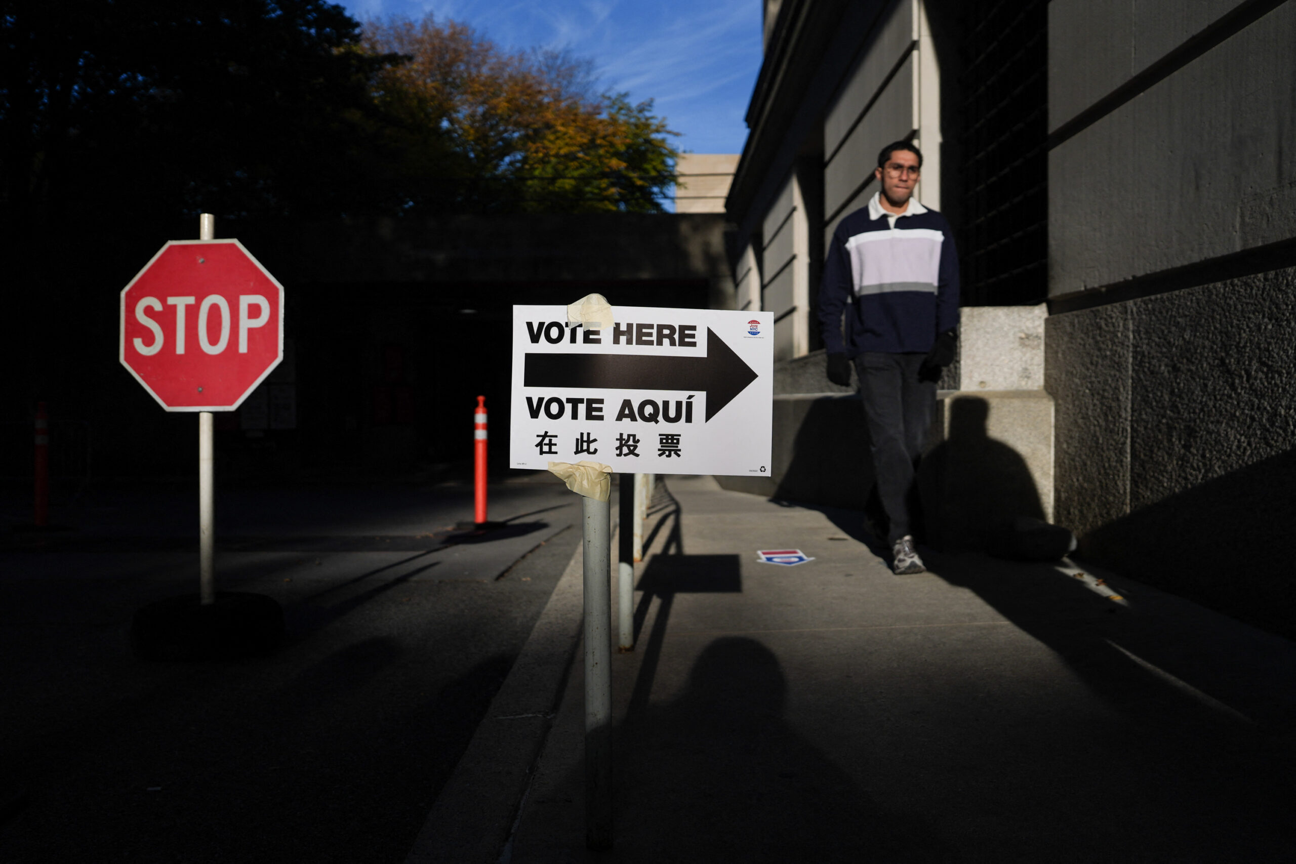 A person at a polling place in New York, on Oct. 24. (Photo: Ryan Murphy/AFP via Getty Images)